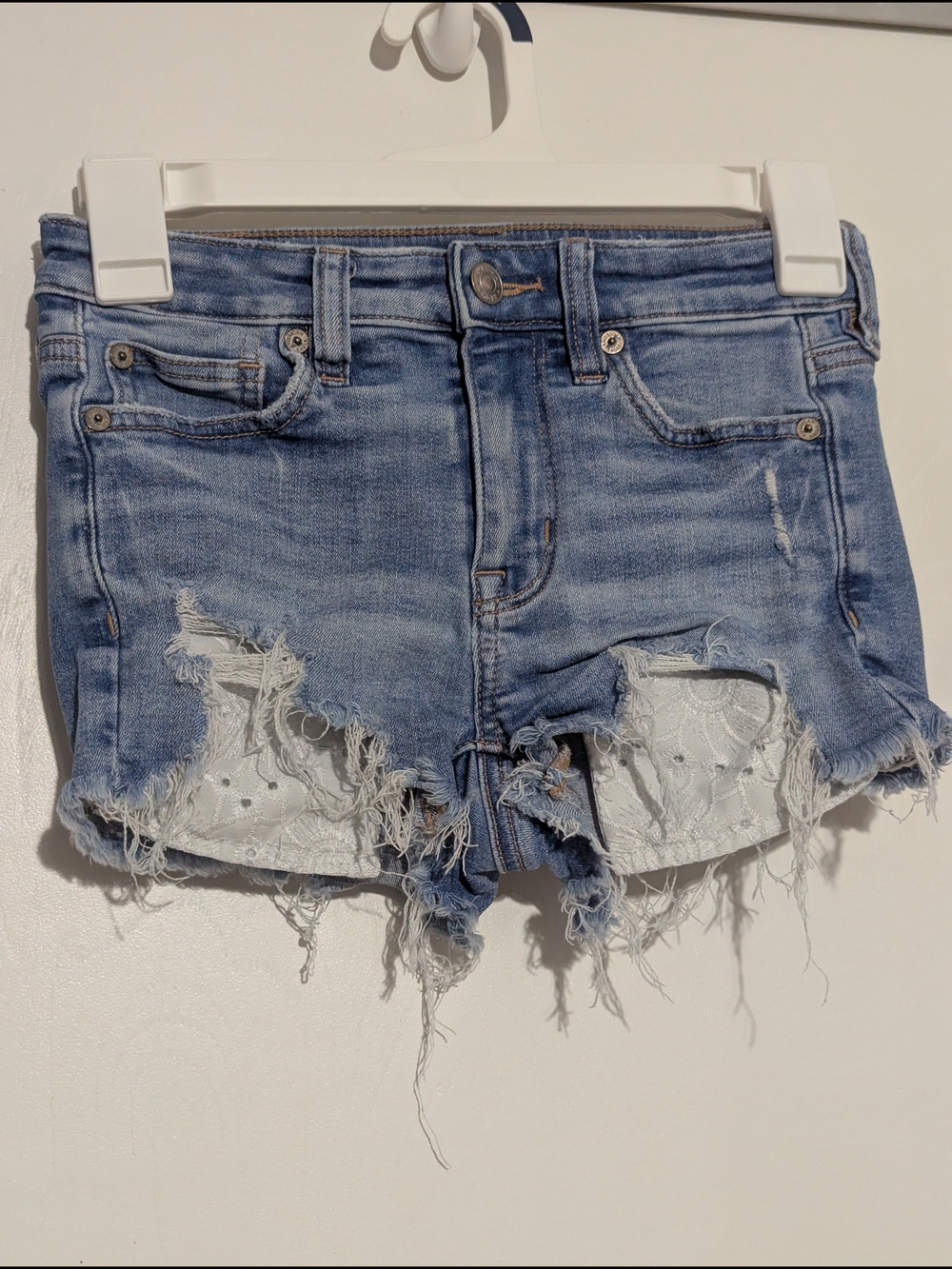 American Eagle Outfitters Light Blue Distressed Denim Shorts with Lace Panels